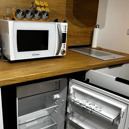 уютни планински с басейн в комплекс алпин лодж Apartament Bansko