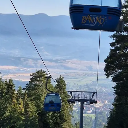 уютни планински с басейн в комплекс алпин лодж Appartement Bansko